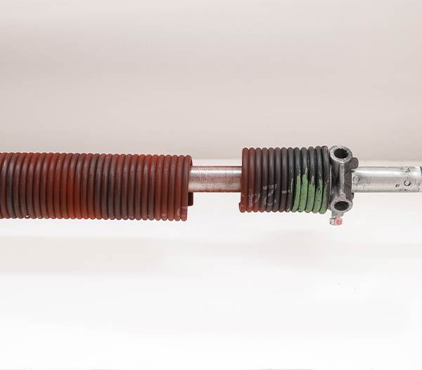 Broken garage door torsion spring