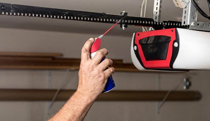 Garage door opener chain oiling