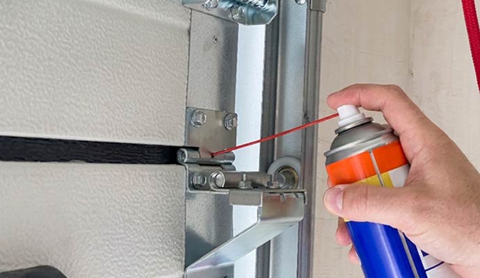 Garage door preventative maintenance spray