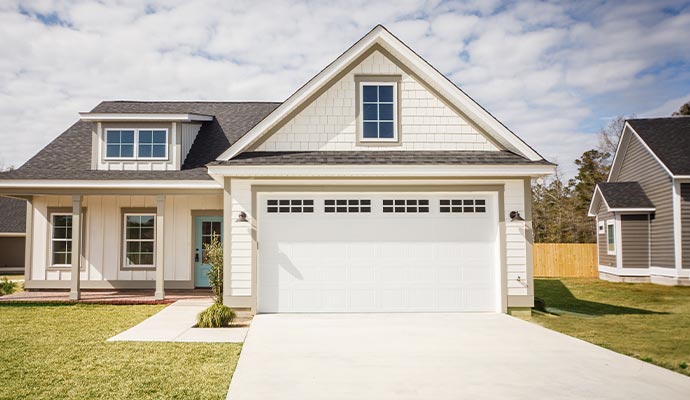 Modern house with white garage door