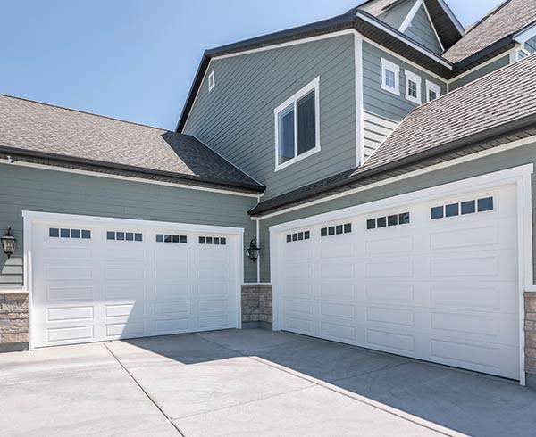 Modern white sectional garage doors
