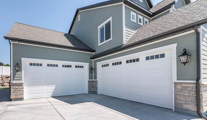 Modern white sectional garage doors