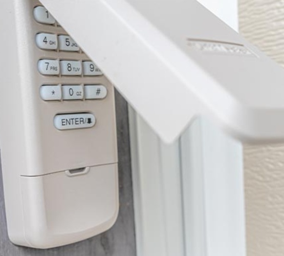 Garage door keypad with protective cover