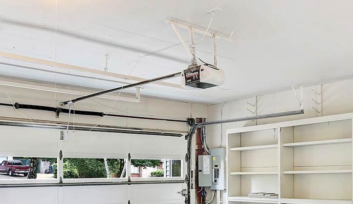 White panel garage door with opener