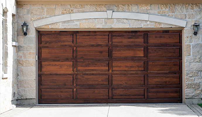 Wood look composite panel garage door