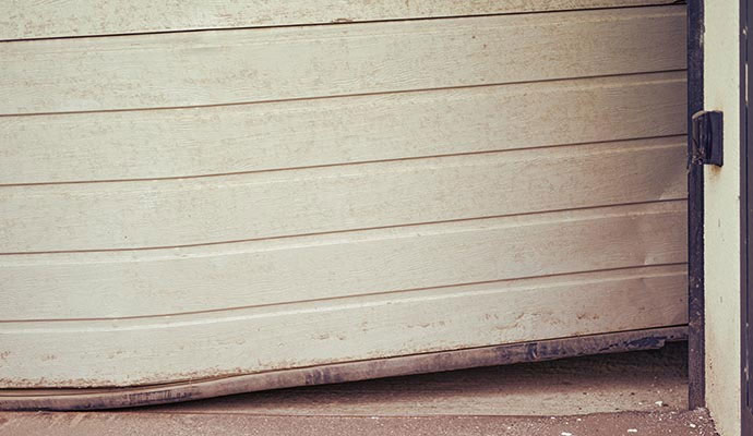 Close-up of garage door perimeter seal and track