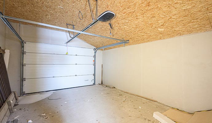Interior garage space with white sectional door