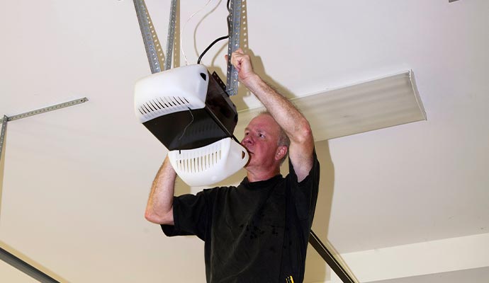 Professional repairing garage door opener