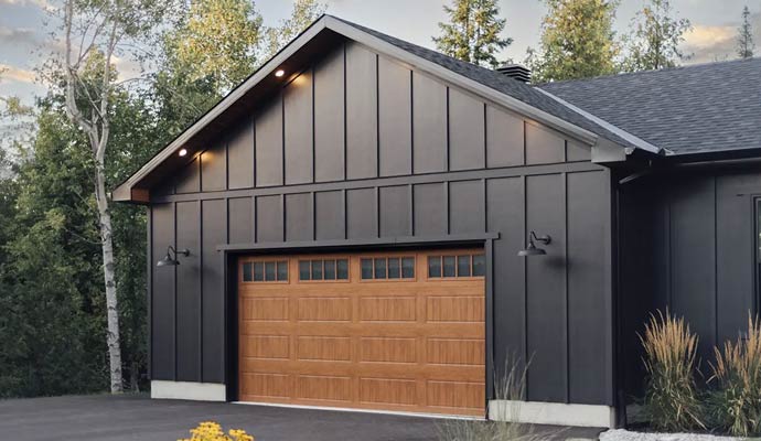 Modern black house wood garage door
