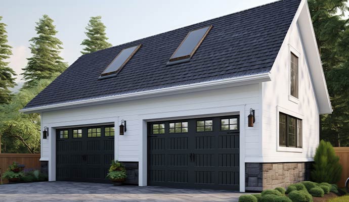 Black carriage house garage doors white siding