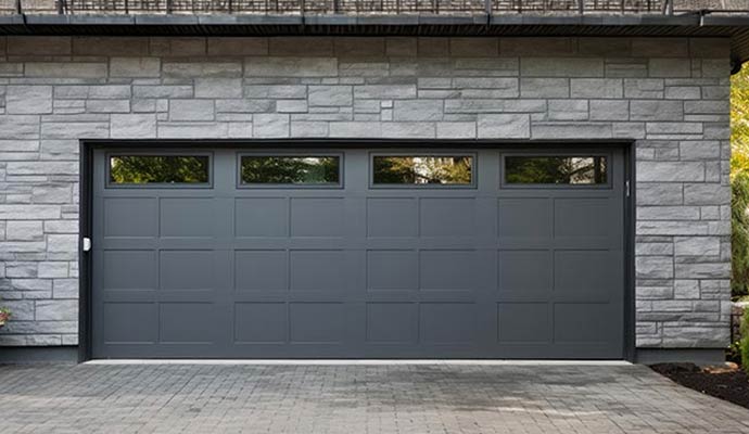 Modern black garage door with windows